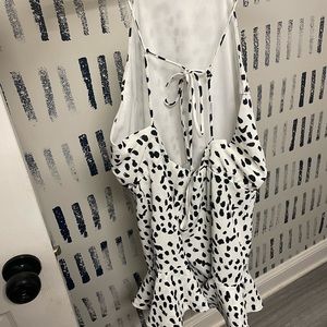 White and black open back romper